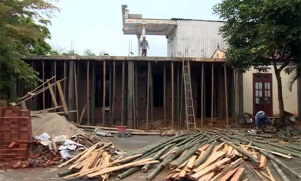 Nhà làm việc bộ phận giao dịch hành chính một cửa liên thông thị trấn Vĩnh Tuy đang được xây dựng.