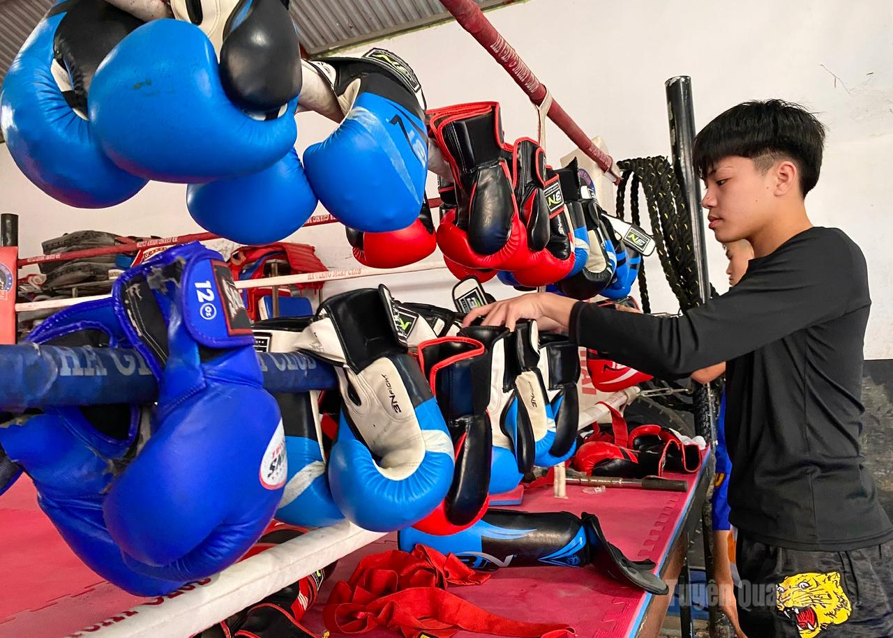 While the festive scent of Tet fills the air outside, inside the gym there is only the distinct smell of boxing gloves and training mats.