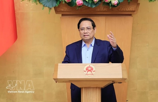 Prime Minister Pham Minh Chinh addresses the meeting. (Photo: VNA)