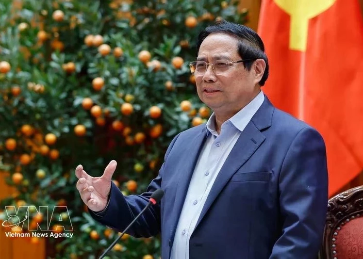Prime Minister Pham Minh Chinh speaks at the meeting of the Governments standing members in Ha Noi on March 4 (Photo: VNA)
