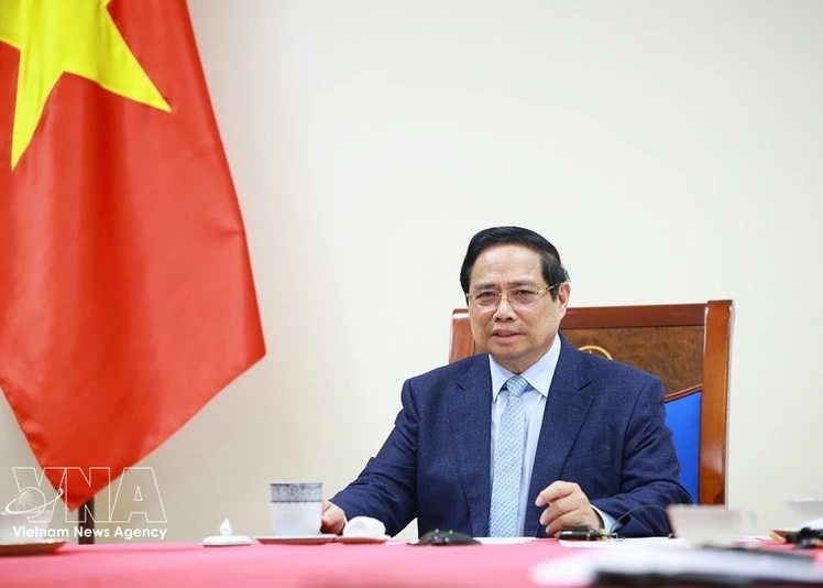 Prime Minister Pham Minh Chinh in the phone talks with Kuwaiti Prime Minister Sheikh Ahmed Abdullah Al-Ahmad Al-Sabah on March 9 (Photo: VNA)