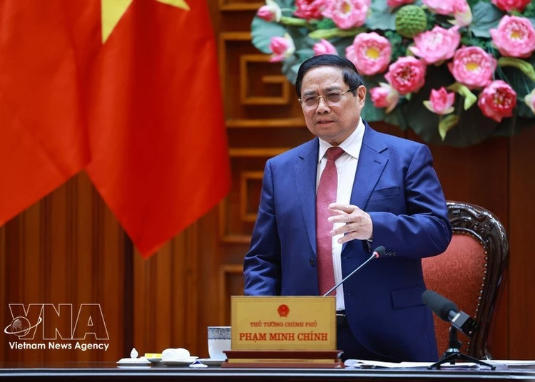 Prime Minister Pham Minh Chinh addresses the meeting. (Photo: VNA)