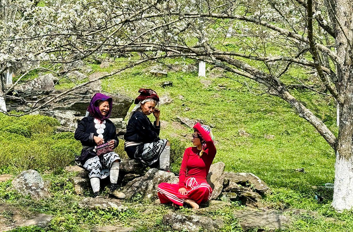 Visitors share moments of tranquility with local people.