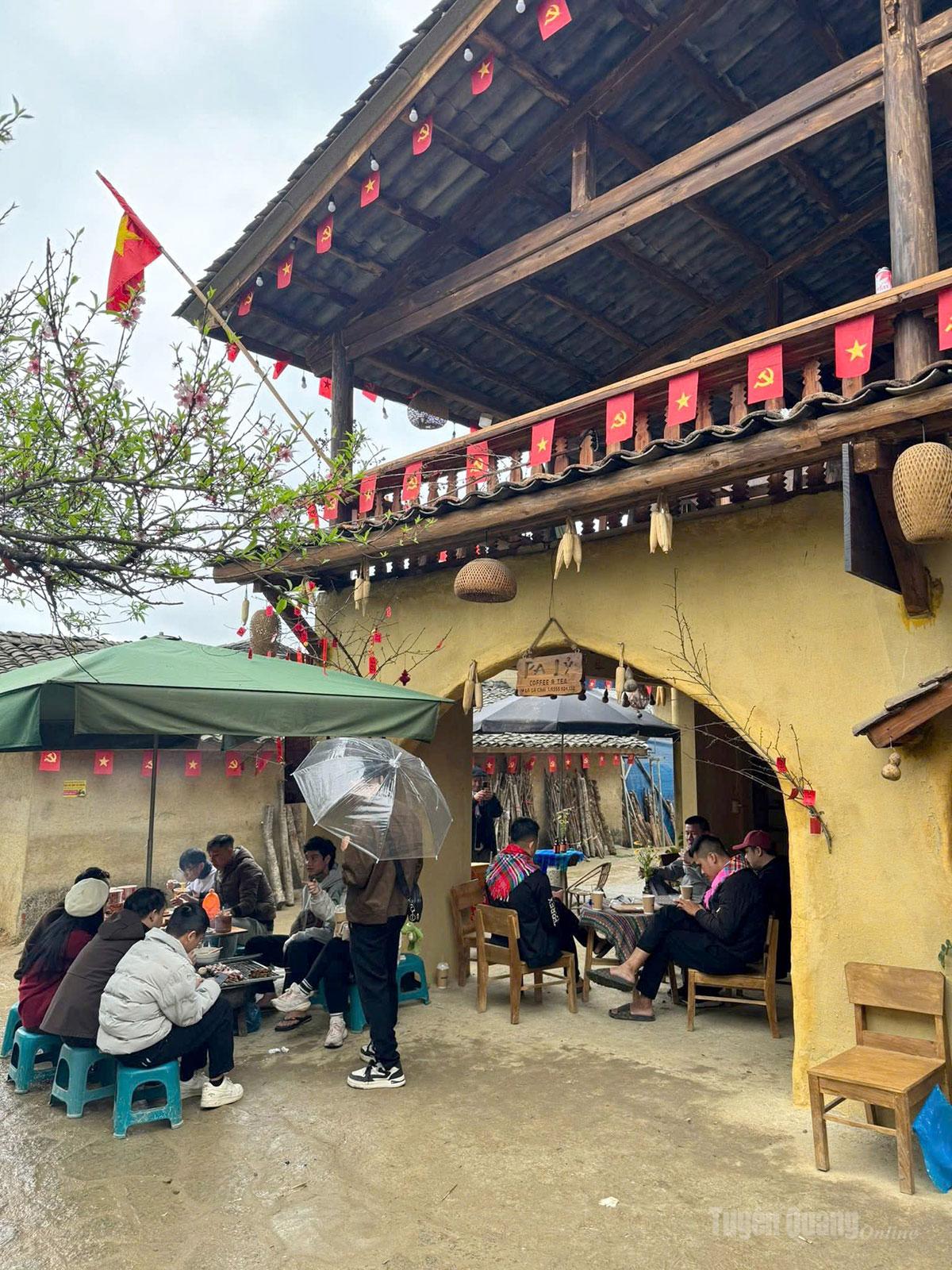 Visitors still come to the village despite the rain.