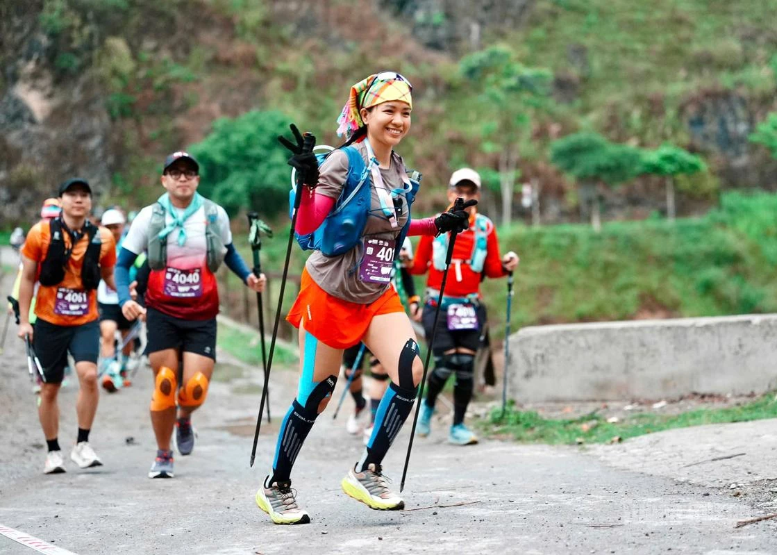 Athletes compete in the “Running on the Happiness Road” ultra trail race.