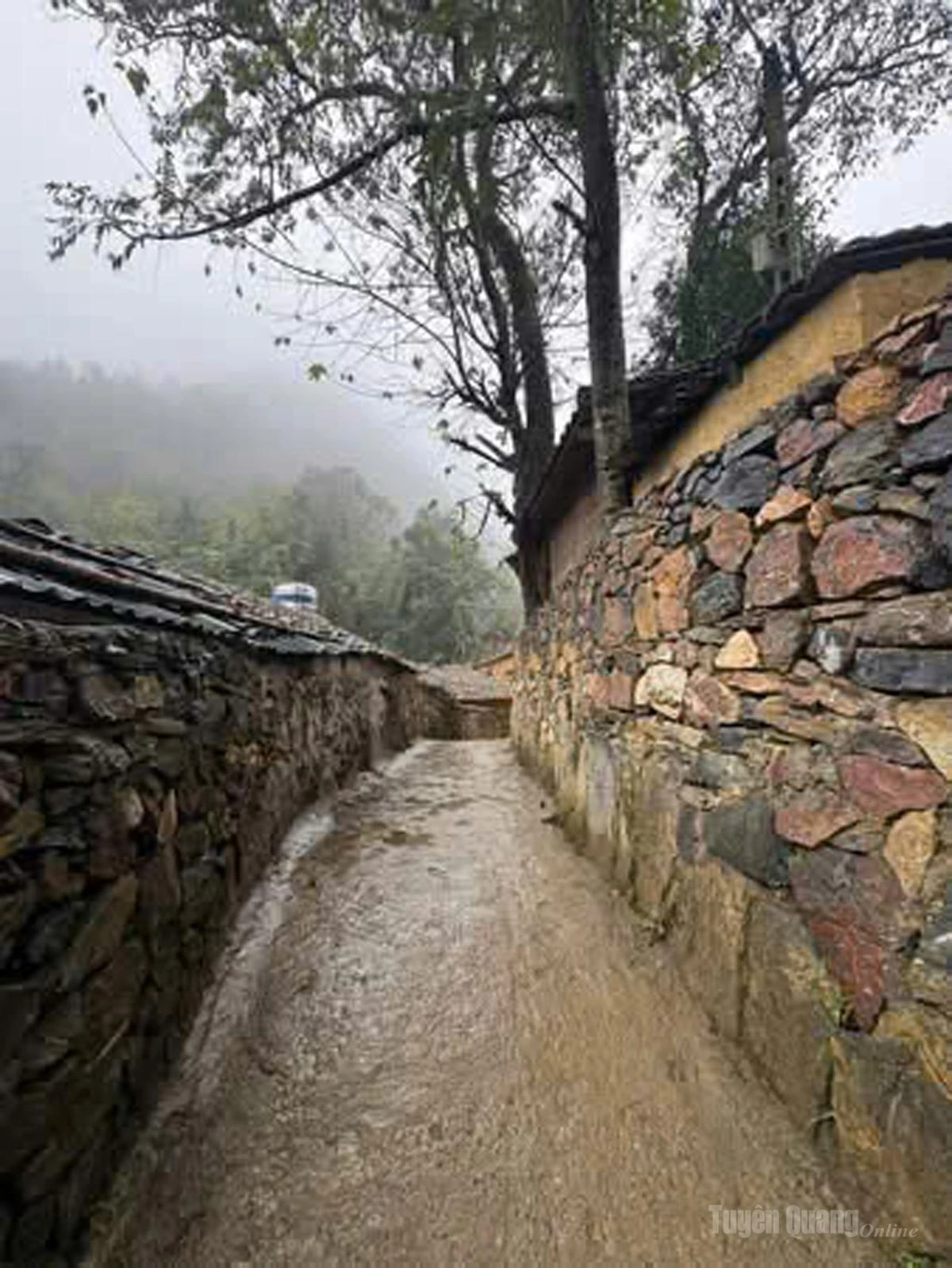 Stone fences and pathways attract visitors to the village.