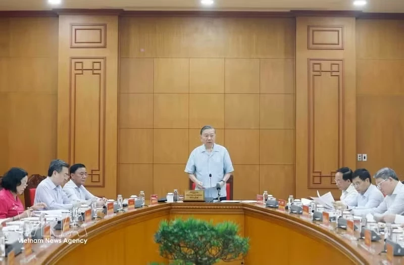 At the working session in Ha Noi on May 20. (Photo: VNA)