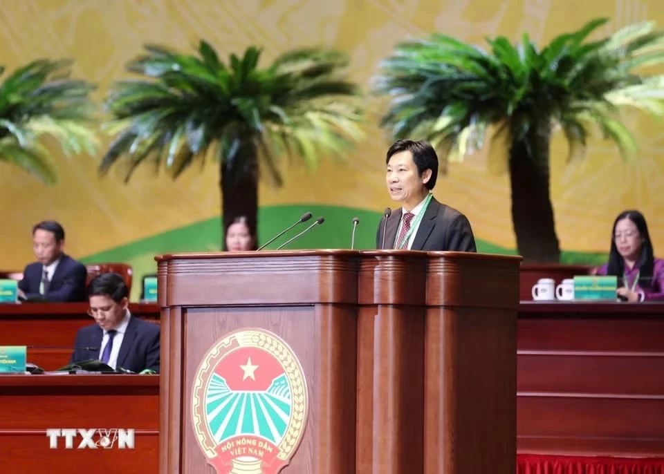 Phó Chủ tịch Hội Nông dân Việt Nam Nguyễn Xuân Định trình bày Quy chế làm việc của Đại hội. (Ảnh: Hoàng Hiếu/TTXVN)