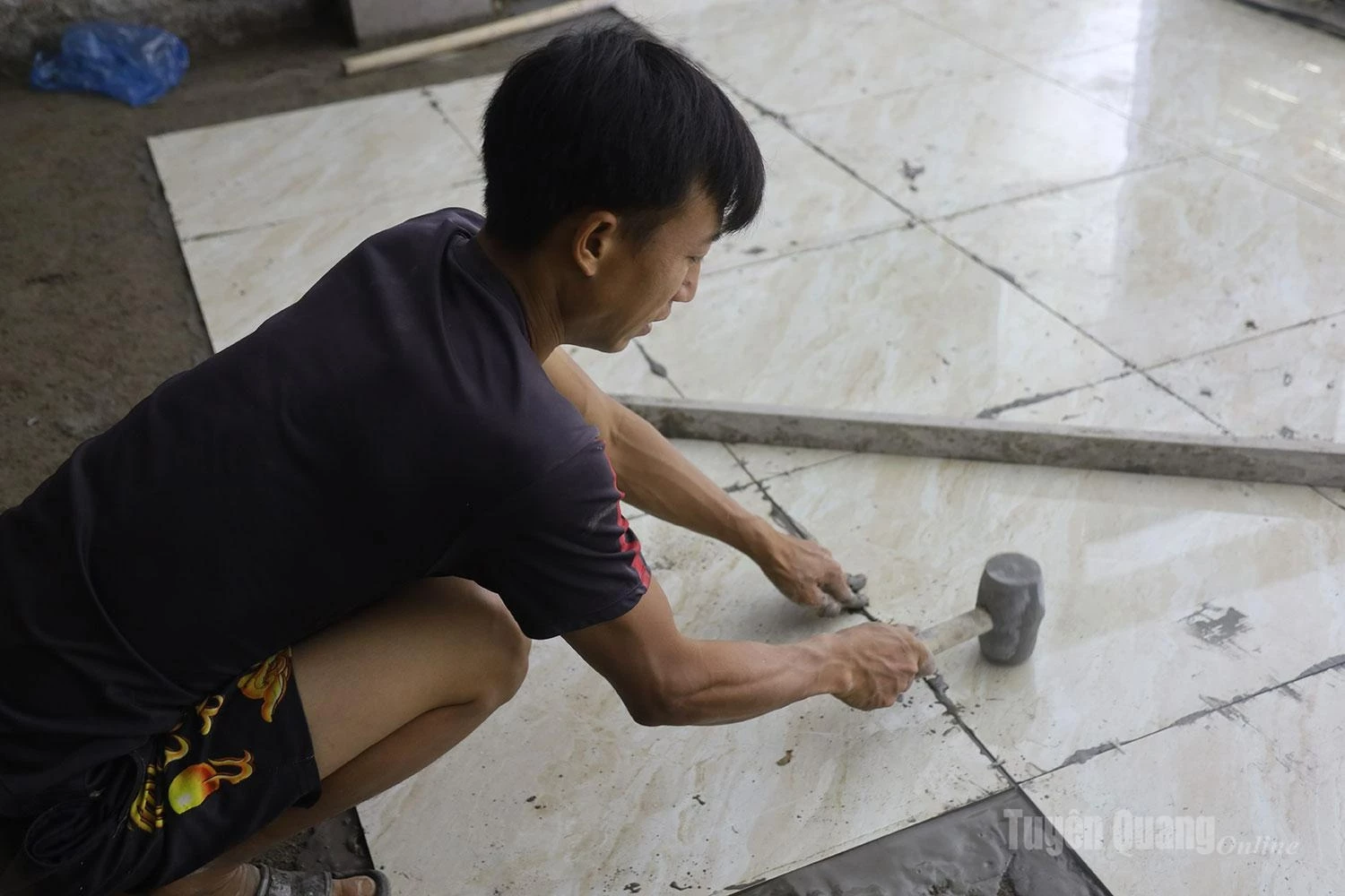 Each floor tile is carefully installed to meet both the projects technical standards and aesthetic requirements.