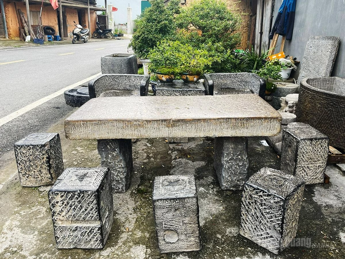 A table and chair set crafted from stone.