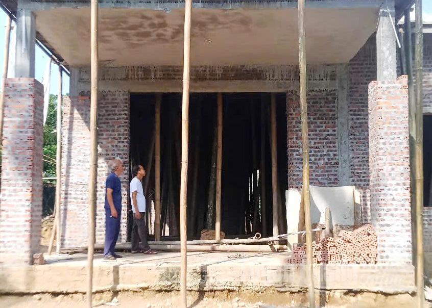The family of Mr. Ma Van Vinh, in Noong Cuong hamlet, Minh Quang commune, received support to build a new home.