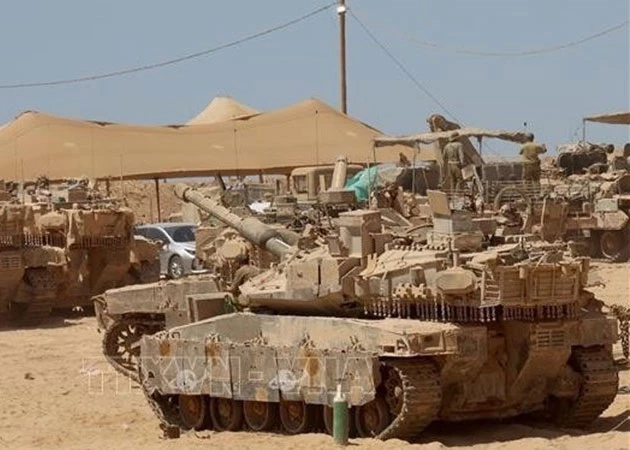 Israeli military vehicles have been deployed near the border with the Gaza Strip. (Photo: Xinhua/VNA)