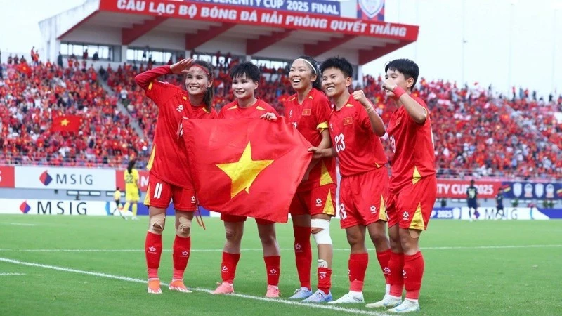 The Vietnamese womens team celebrates their victory over Thailand.