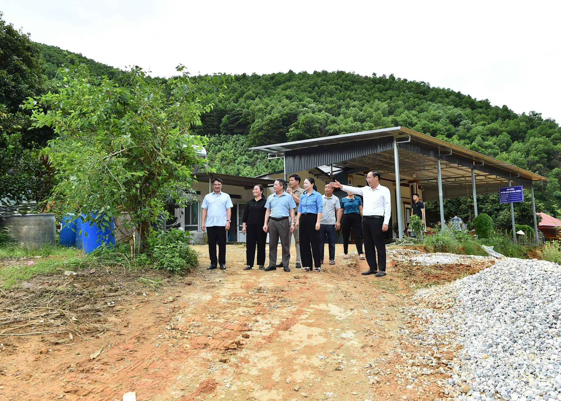 Officials of Yen Phu Commune inspect the progress of infrastructure development projects across the locality.