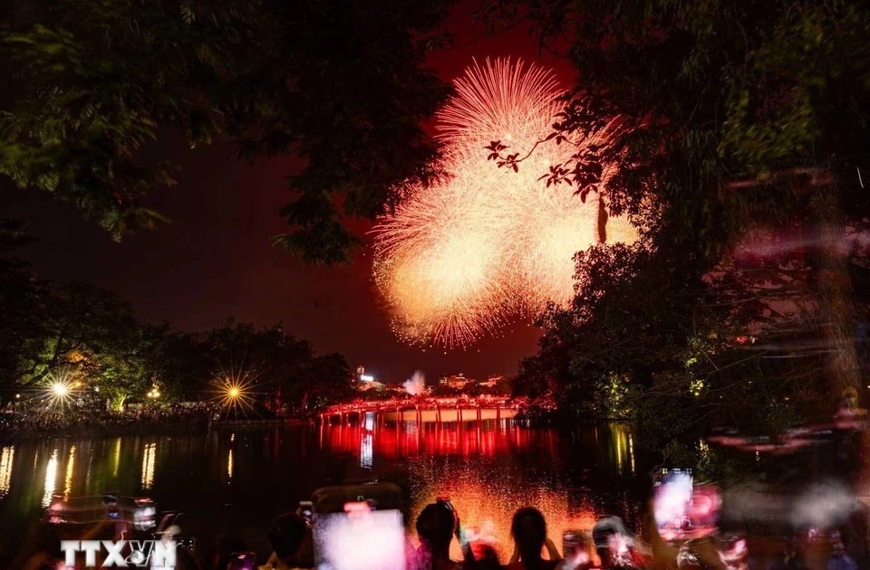 A fireworks display by Hoan Kiem Lake