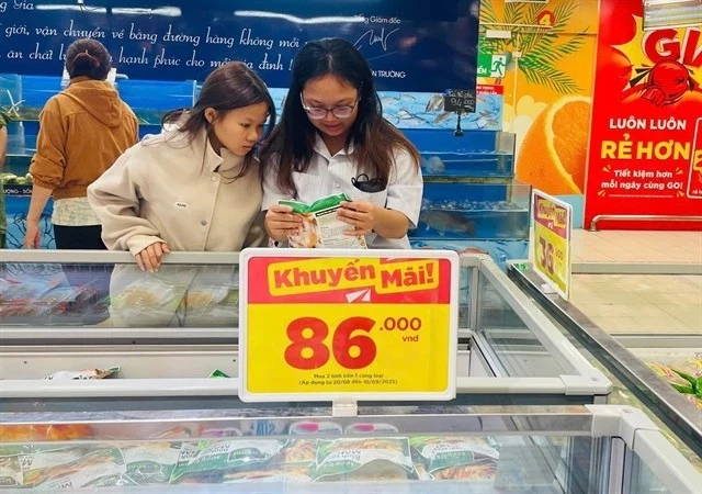 Consumers shop at a supermarket in Ho chi Minh City. 