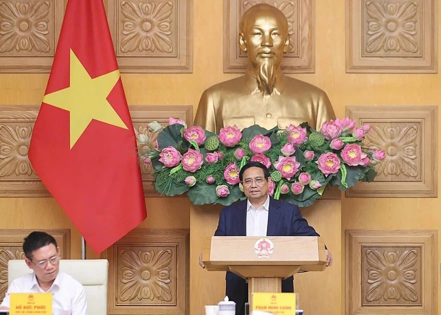 Prime Minister Pham Minh Chinh works with the Policy Advisory Council. Photo: VNA