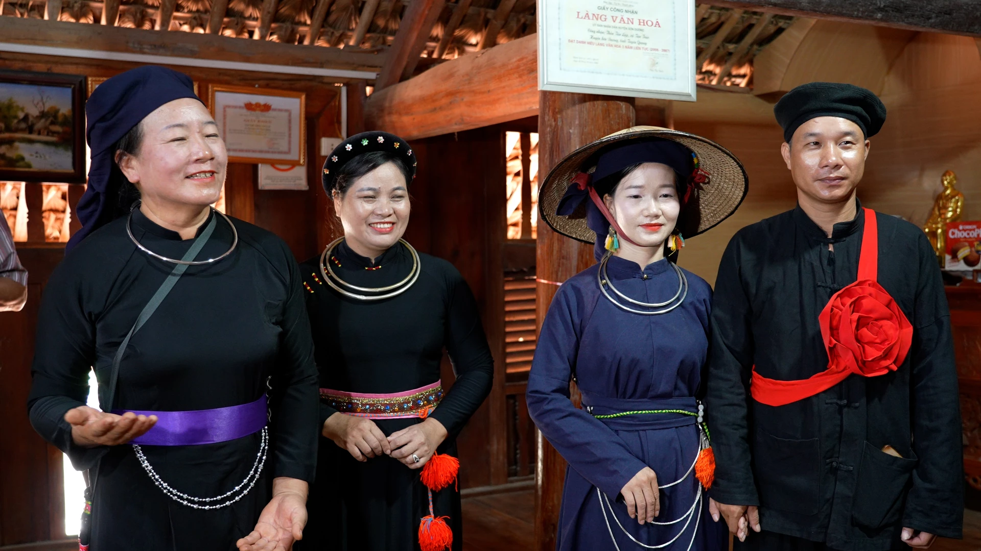 The two families carry out the formal procedures for handing over the bride.