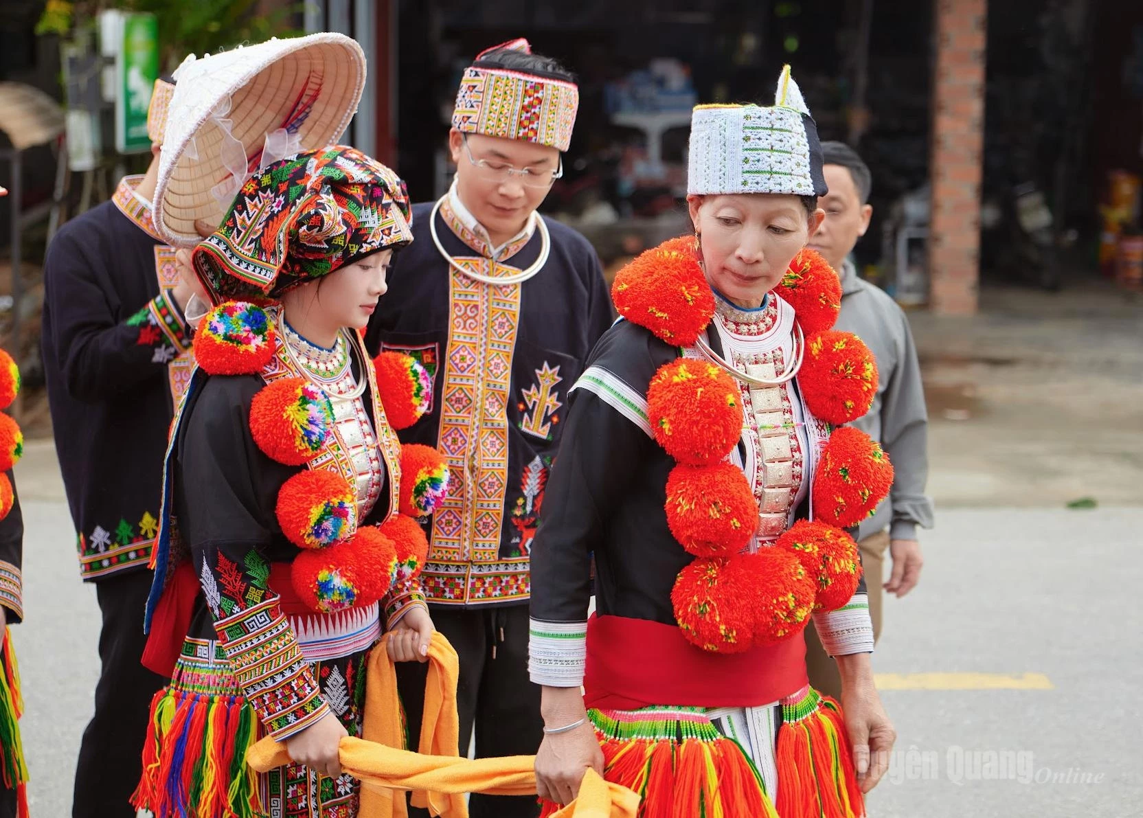 Bride Ngoc Dung follows the groom’s family to Bo Ngoang Village in the traditional wedding attire of the Red Dao people.
