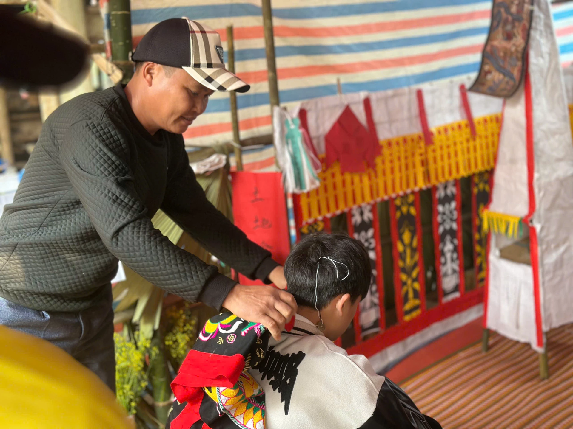 The ritual master then gives the initiate a new spiritual name. From this point onward, the person who has undergone the Cap Sac ritual is recognized as having the right to participate fully in community activities.