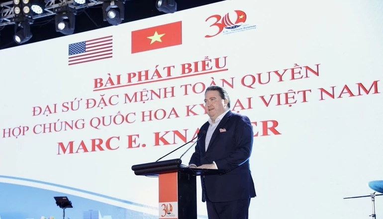 US Ambassador to Viet Nam Marc E. Knapper delivers remarks at the programme. (Photo: DINH HOA)