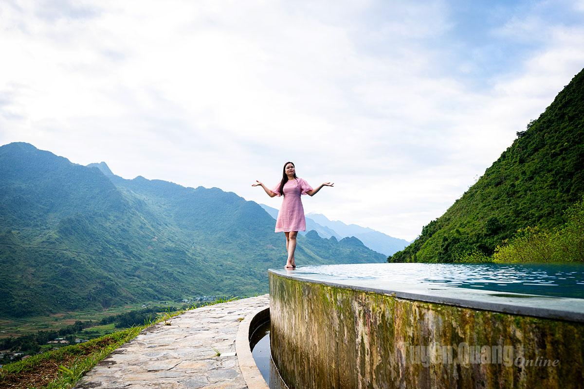 Visitors pose for photos at the resort’s infinity pool.