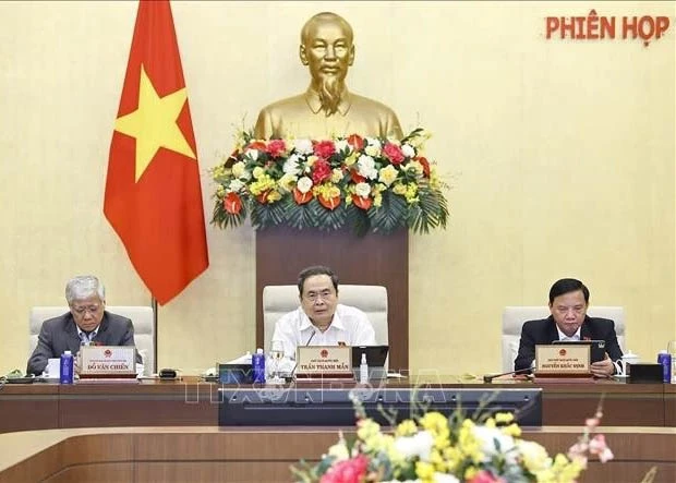 National Assembly Chairman Tran Thanh Man (centre) speaks at the NA Standing Committees 52nd session in Ha Noi on December 2. (Photo: VNA)