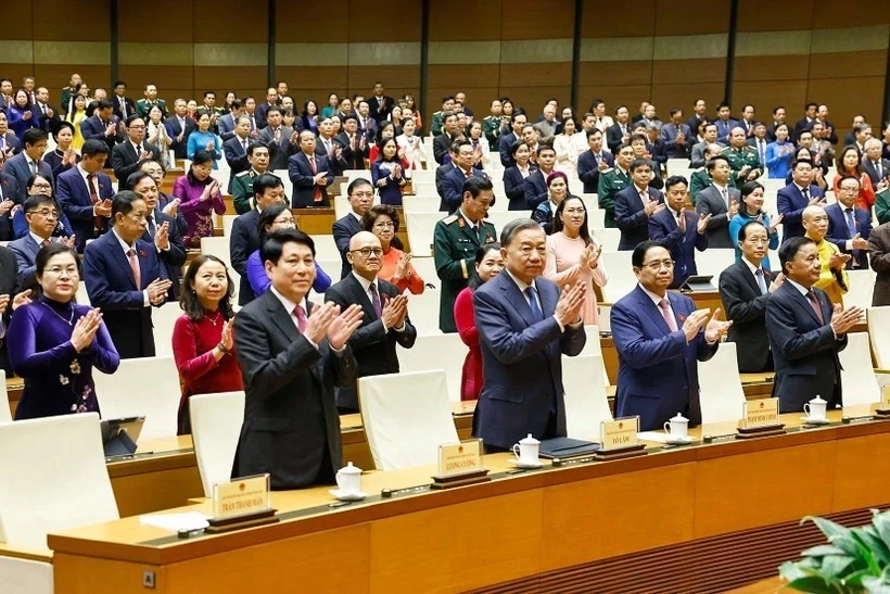 Party General Secretary To Lam (second from left), other high-ranking Party and State leaders, and NA deputies attend the closing session of the 15th NAs 10th session (Photo: VNA)
