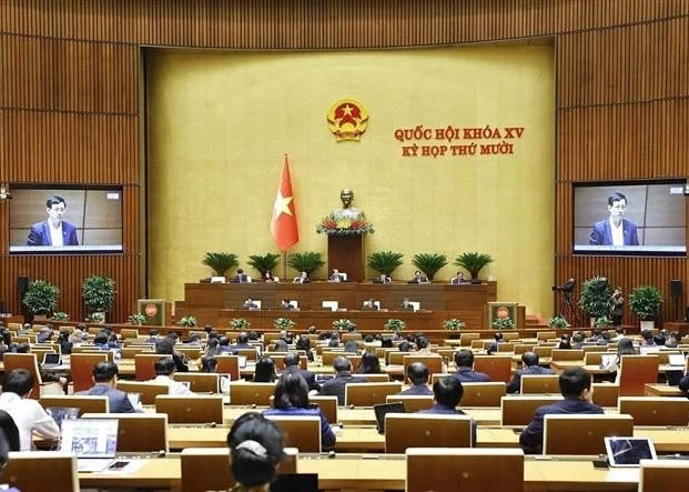 Legislators are expected to adopt amended or new laws in taxation, population, public health, planning, cybersecurity, national secrets protection, defence industry, oversight activities of elected bodies, e-commerce, and multiple education-related laws (Photo: VNA)