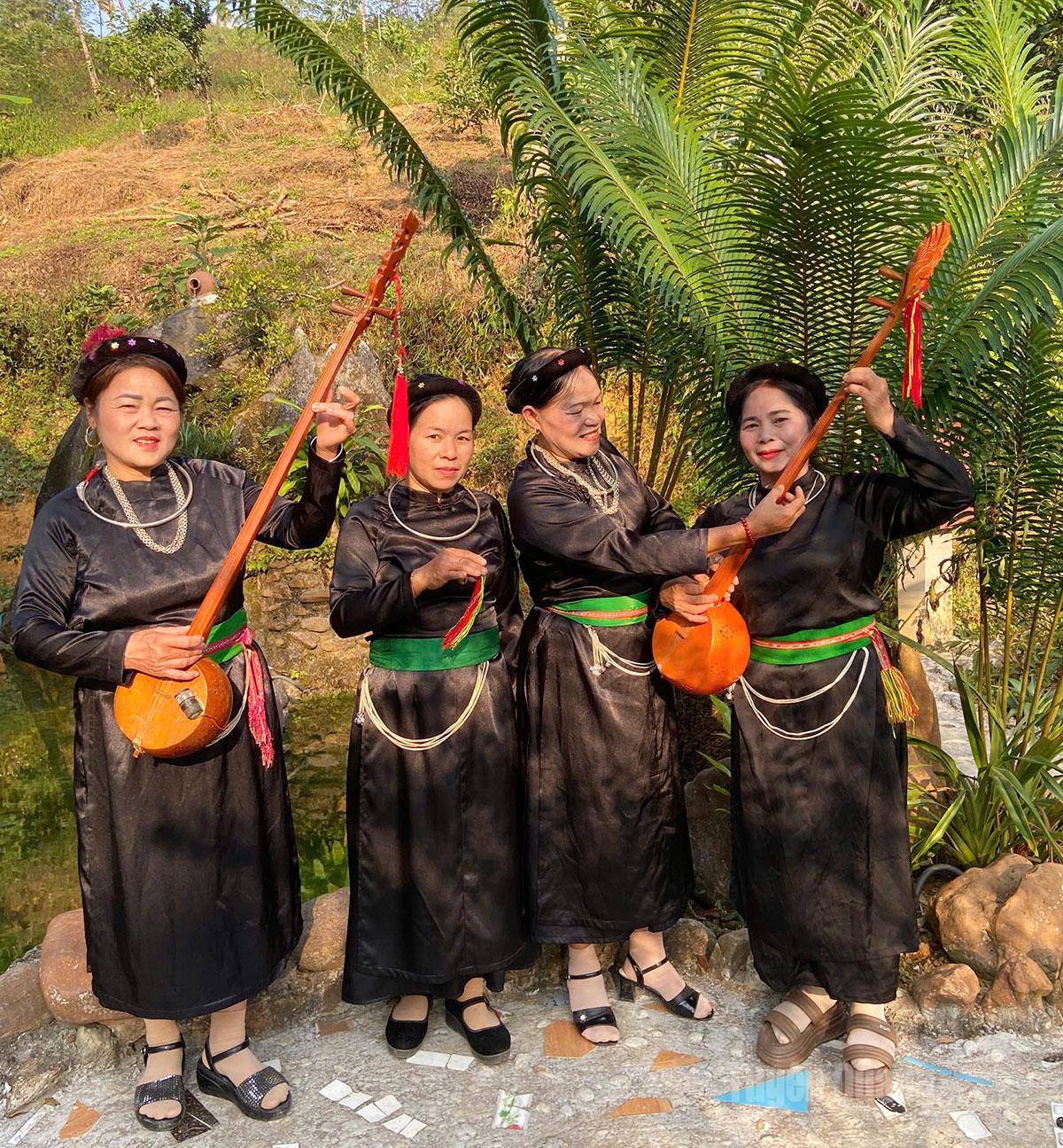 Members of the club wear traditional Tay ethnic costumes during performances.