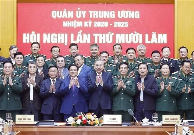 Party General Secretary To Lam and officials at the meeting (Photo: VNA)