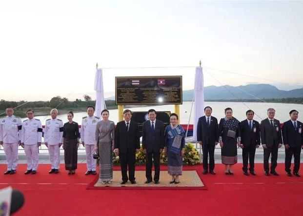 Delegates at the inauguration of the fifth Laos–Thailand Friendship Bridge on December 26. (Photo: VNA)
