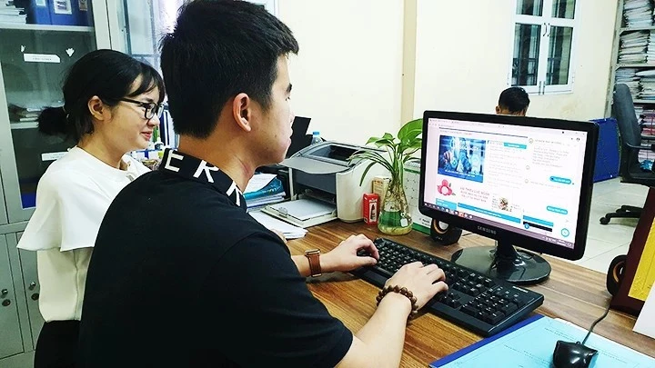 Hà Nội xây dựng cơ sở dữ liệu dùng chung từ số hóa tài liệu. (Ảnh: CÔNG NGHỆ) 